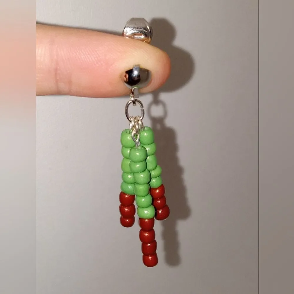 Green and brown beaded 3 stick earrings